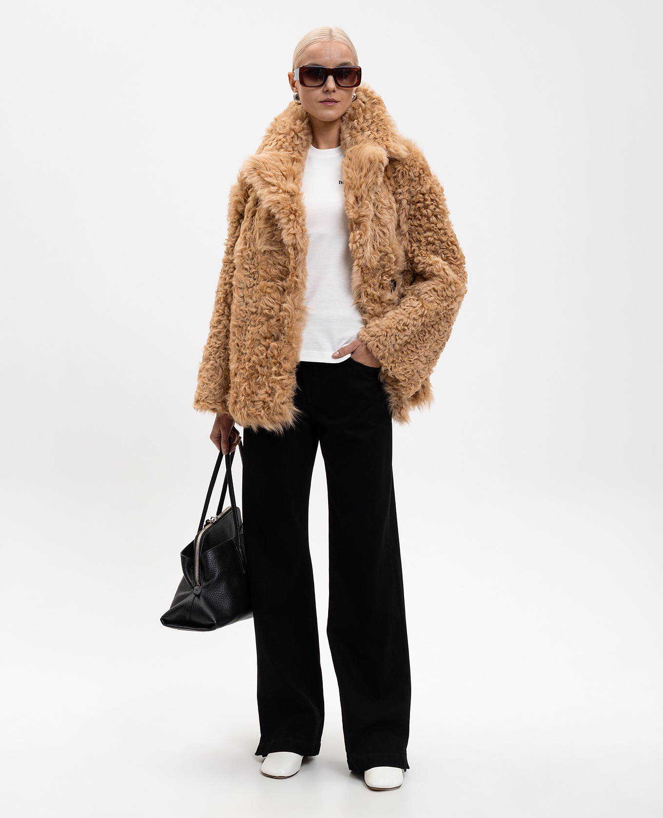 

Black jeans with logo patch The Attico