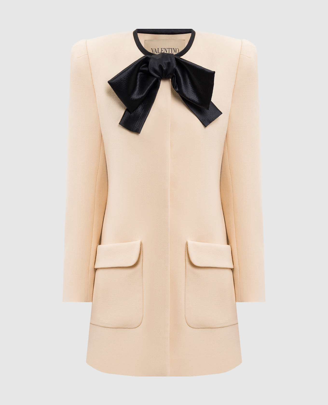 

Beige wool coat with appliqué Valentino