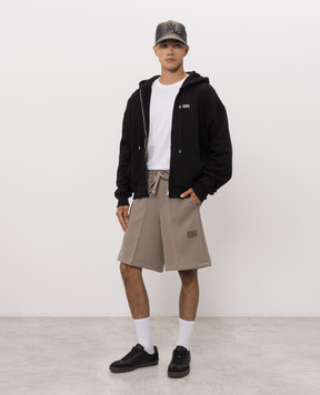 AMIRI Beige shorts with logo patch AMBMSO1082