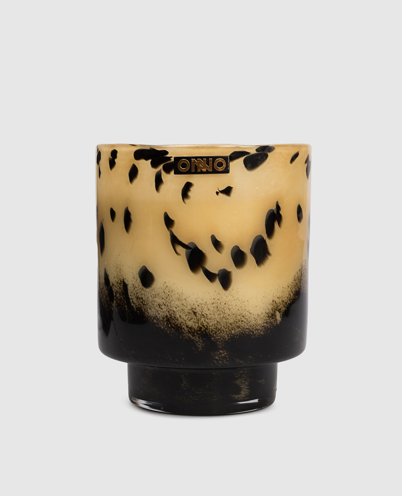

Art Brigitte  candle with Zanzibar scent in a glass candle holder Onno, Beige