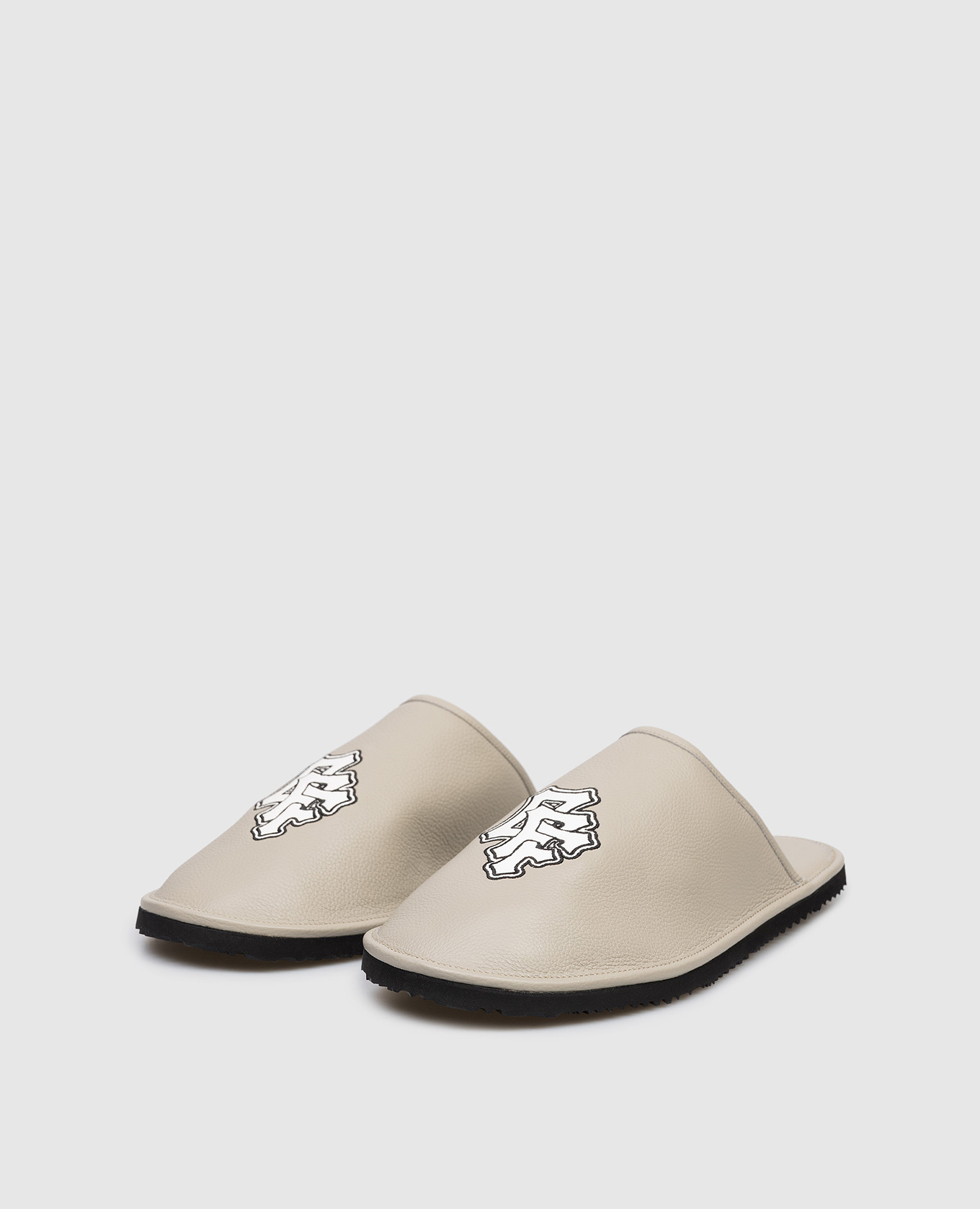 

Beige leather slippers with logo embroidery Off-White