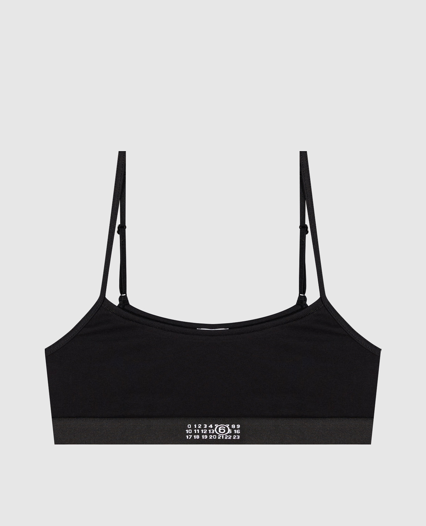 Black top with emblem pattern