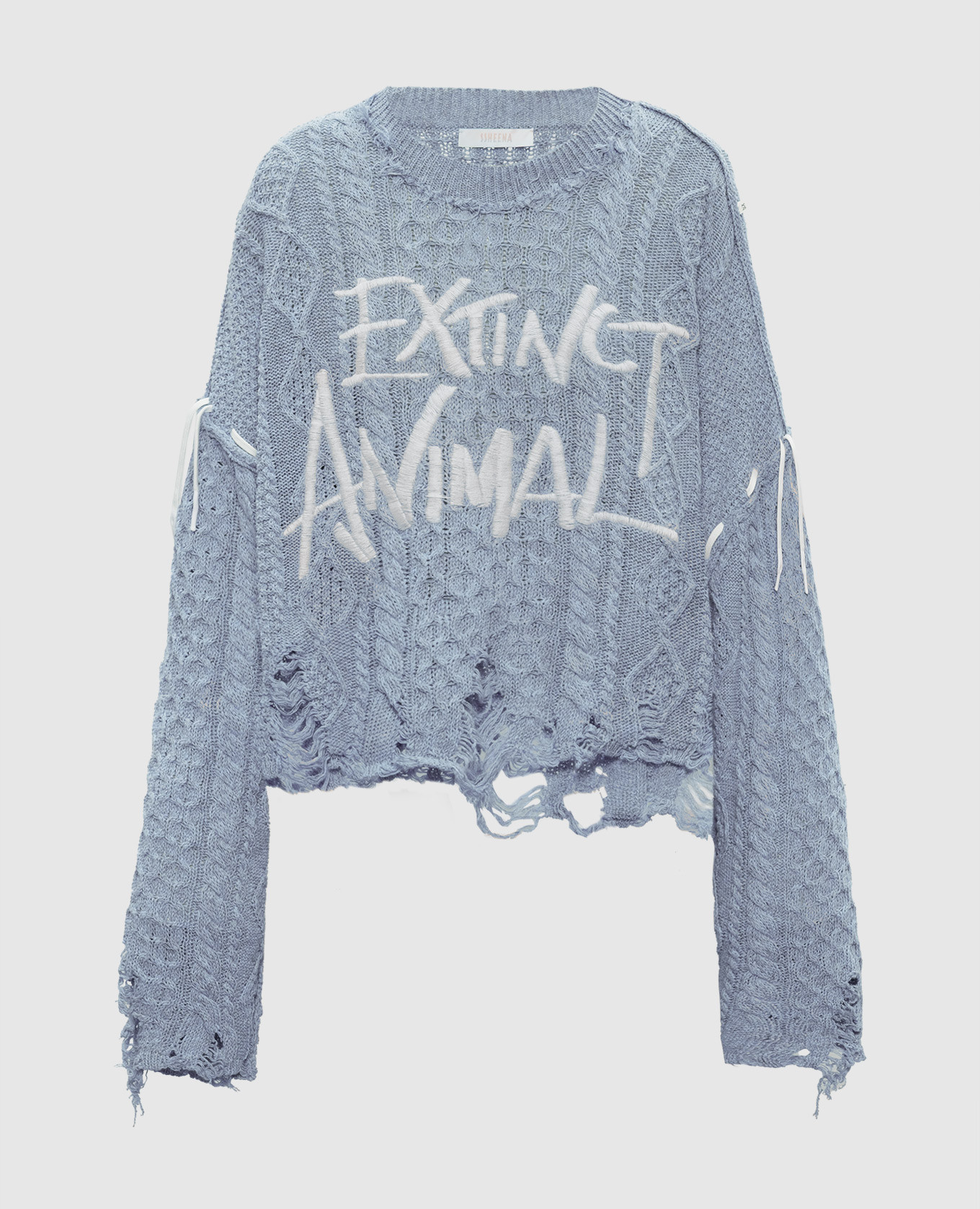 Blue Konfetto sweater with patterned slits