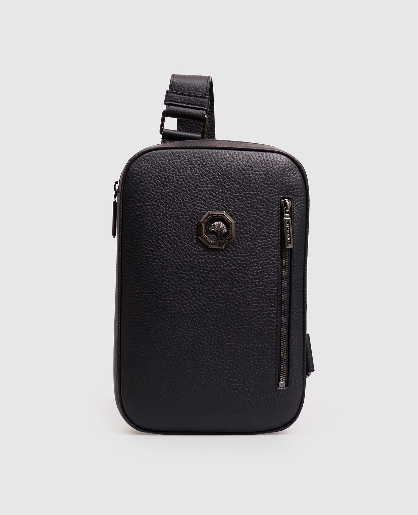 Blue leather sling bag with textured emblem