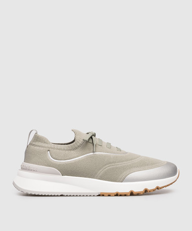 Green sneakers with logo