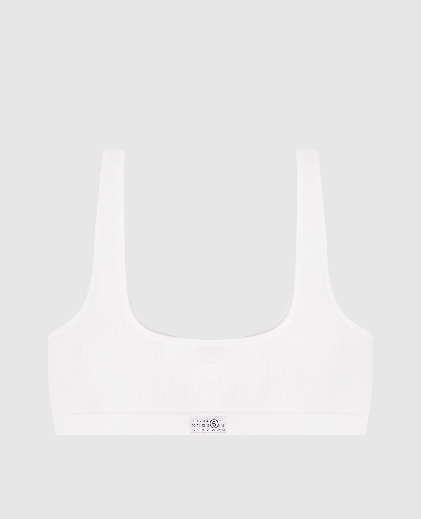 White top with logo patch