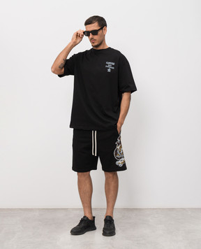 Comme des Fuckdown Black T-shirt with branded print FMS6CFABM01952