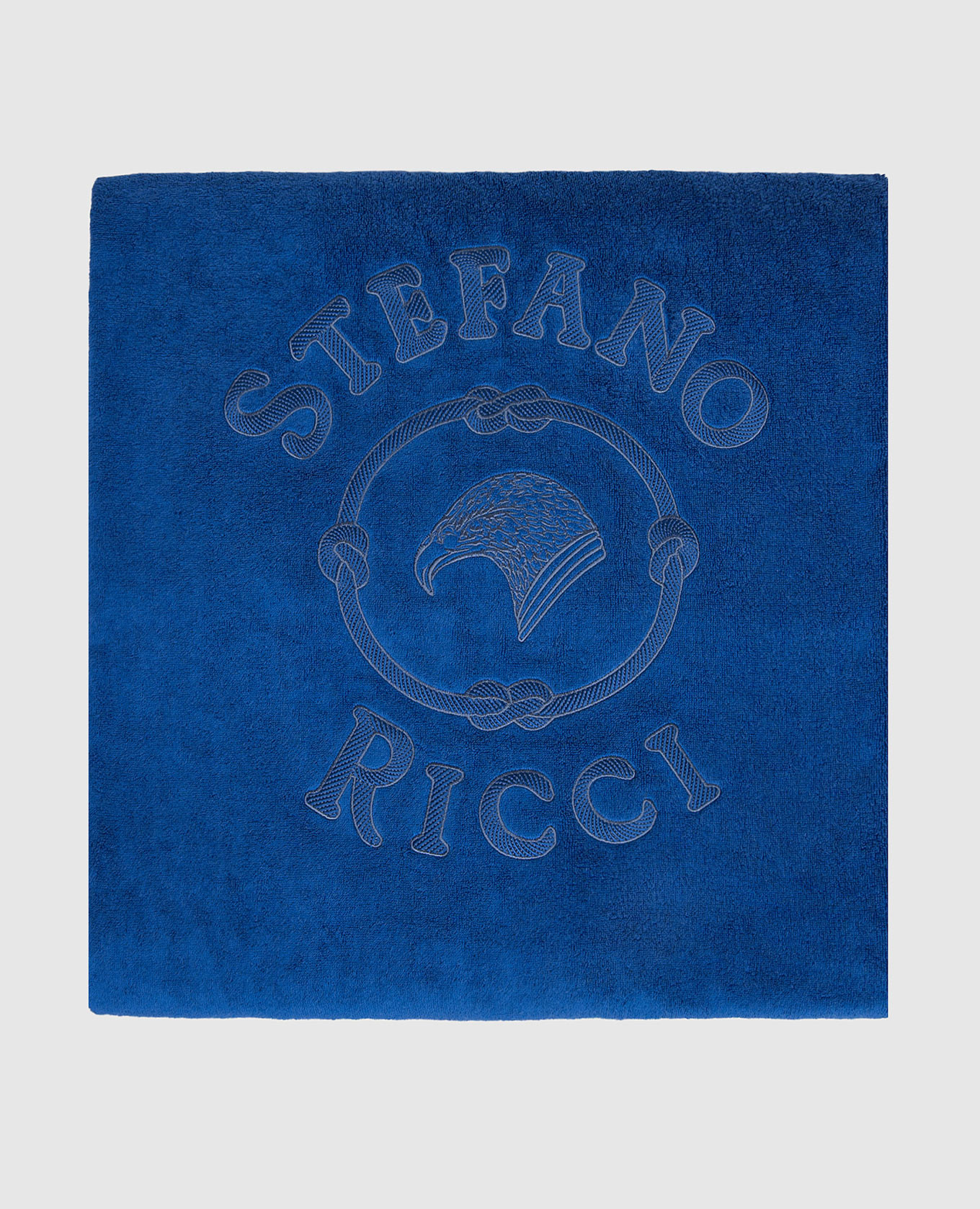 Blue terry towel with embroidered emblem