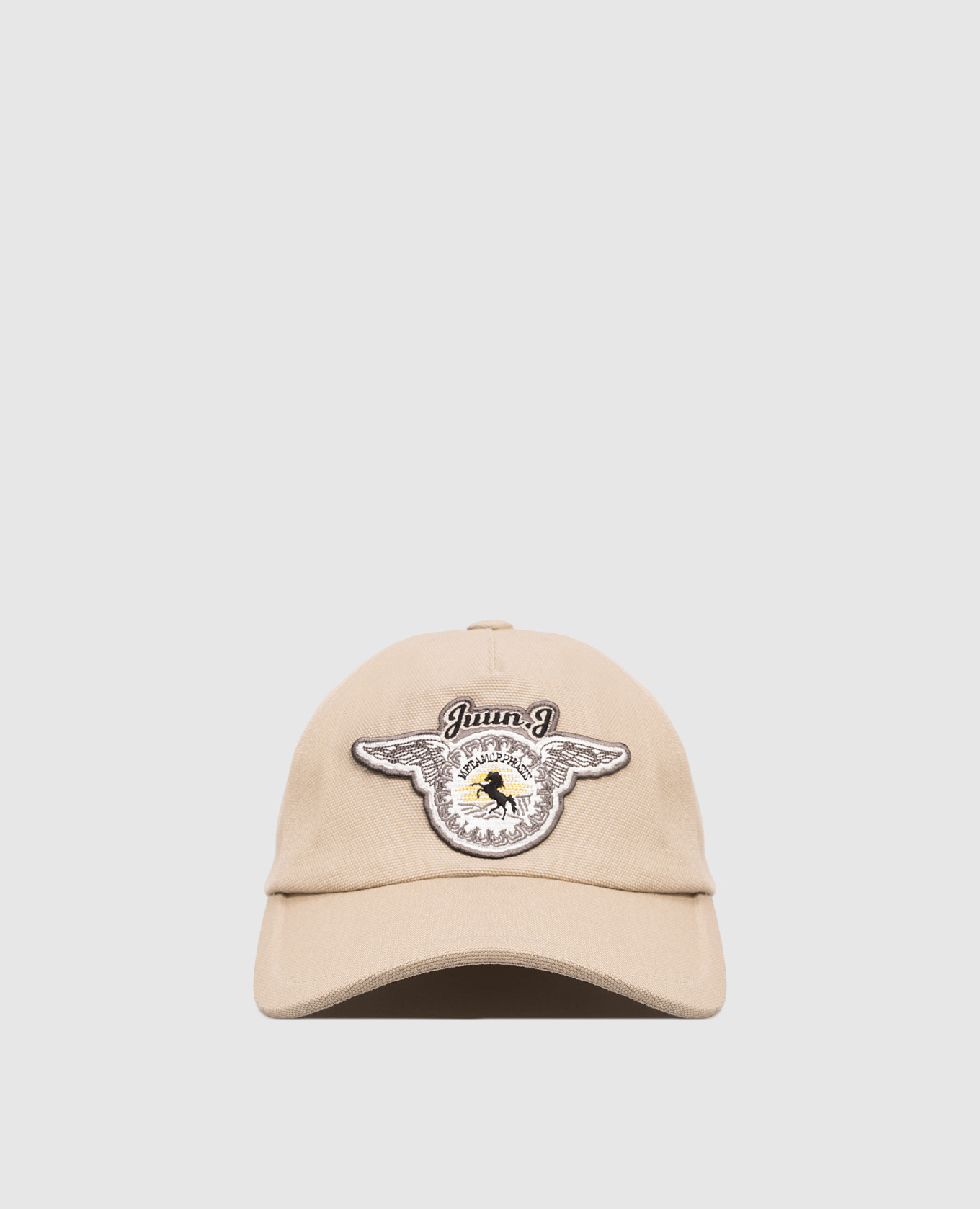 

Beige Metamorphosis cap with applique Juun.j
