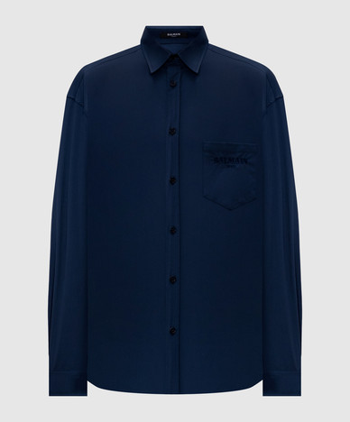 Chemise bleue avec logo brodé