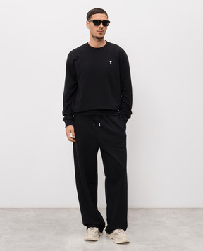 Ami Paris Black sweatpants with Ami de Coeur embroidered logo HTR856730