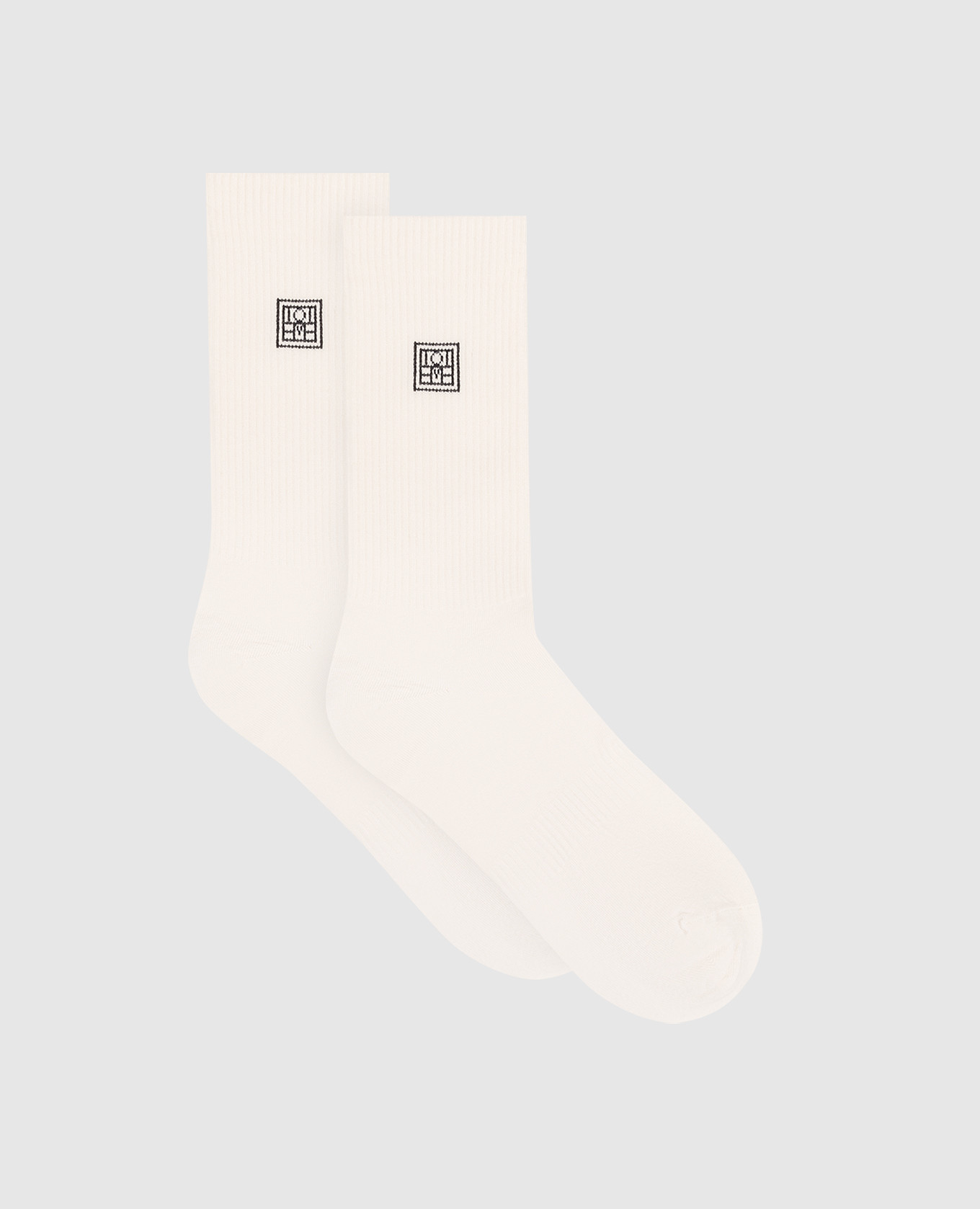 

Set of beige socks with monogram Toteme