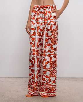 Dolce&Gabbana White silk pants with branded print FTDBNTGDDRE