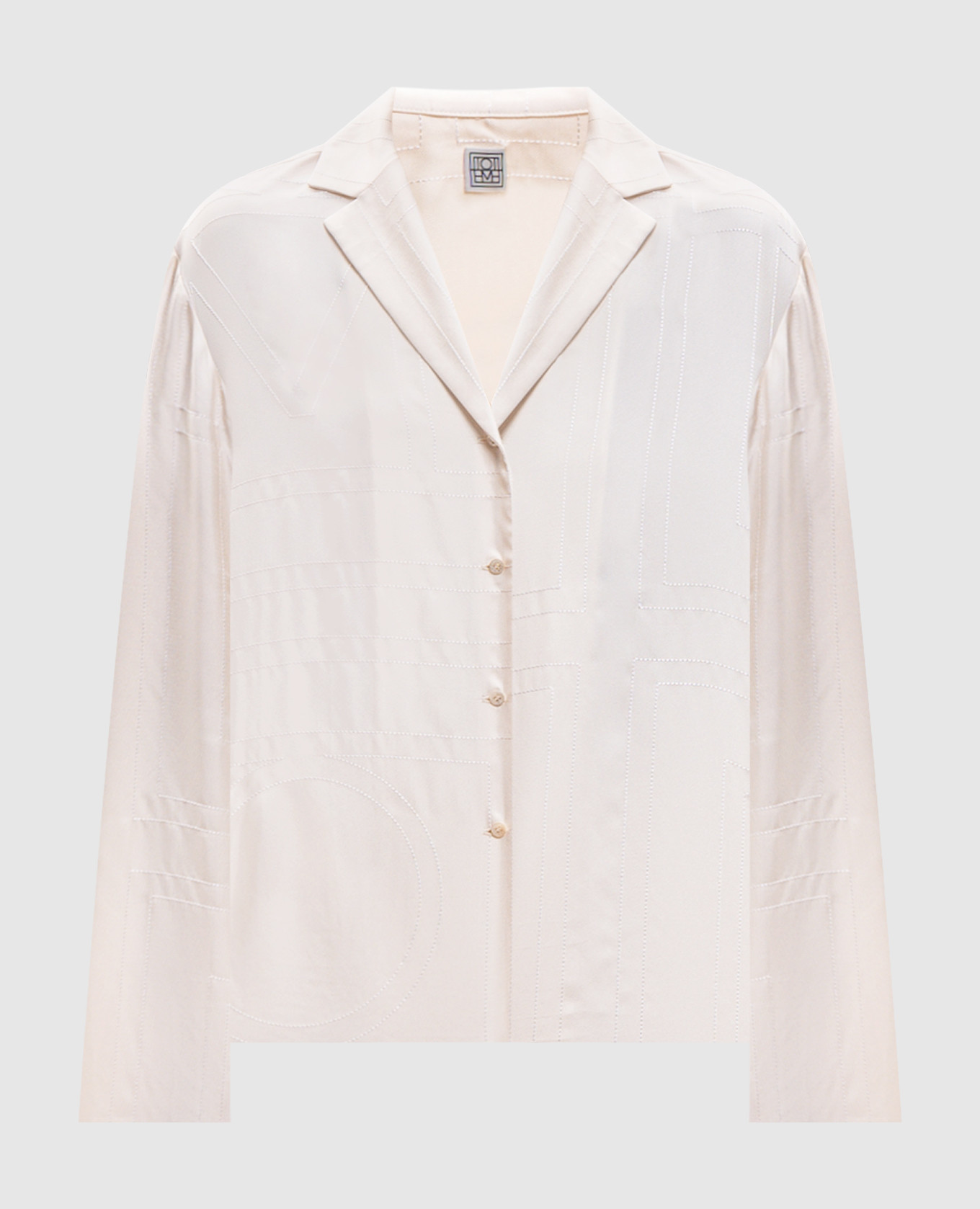 Beige silk blouse with monogram embroidery