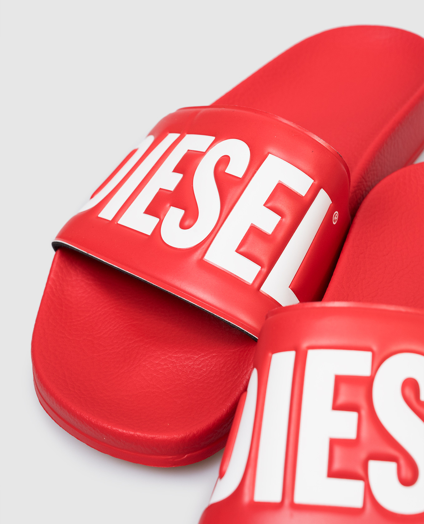

Children's red sliders with embossed logo Diesel