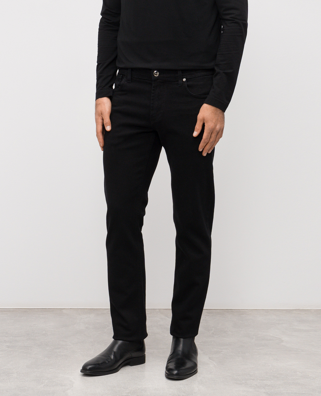 

Black jeans with logo patch Enrico Mandelli