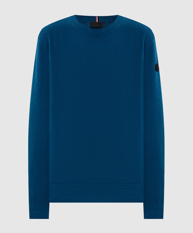 Blue jumper with logo patch