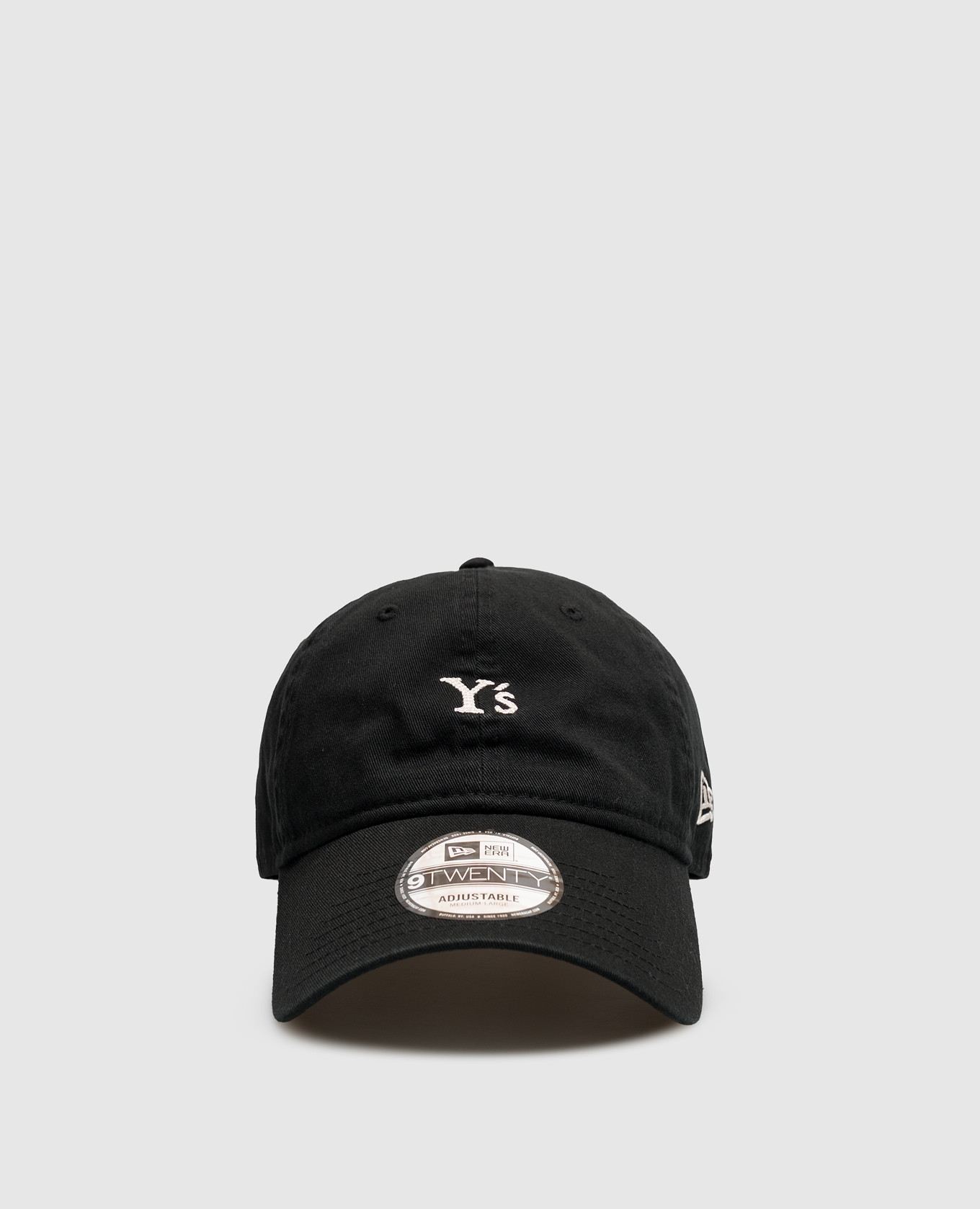 Black cap with embroidered monogram