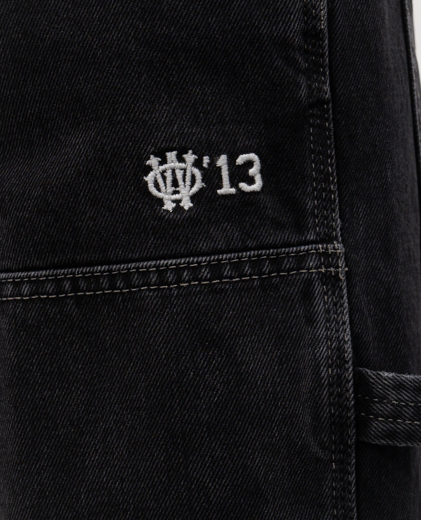 

Black jeans with logo patch Off-White