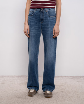 Brunello Cucinelli Blue jeans with a frayed effect and a monil chain MB114P4006