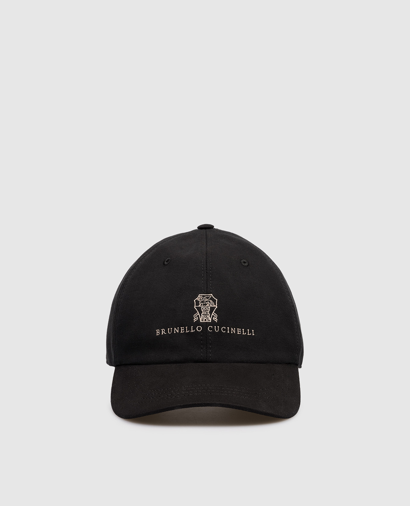Black cap with embroidered emblem