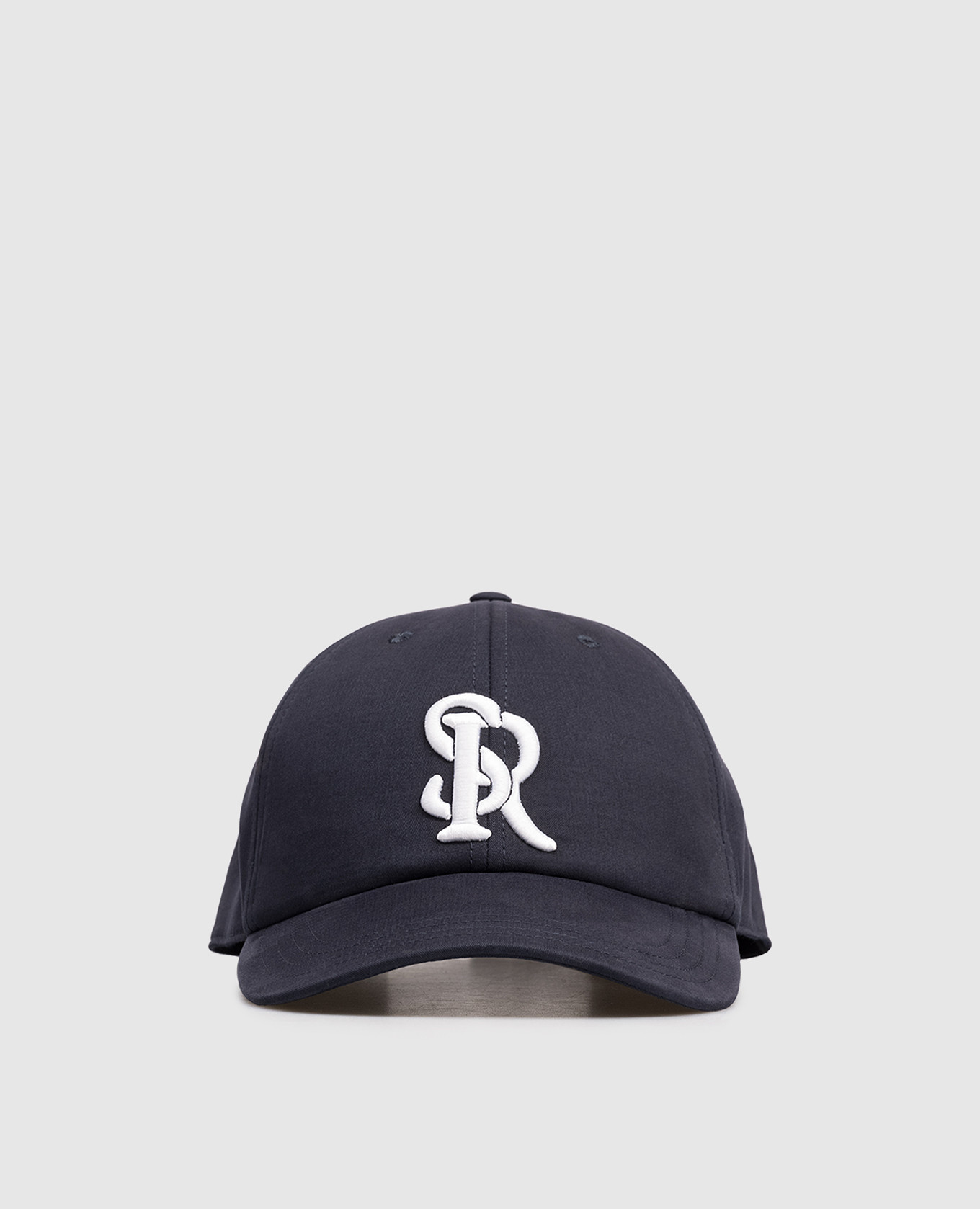 Blue cap with contrasting logo monogram