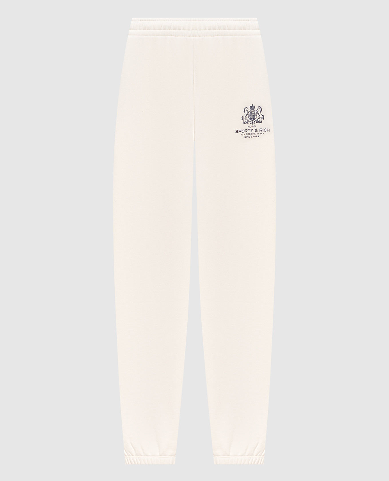 Pantalones deportivos color marfil del Hotel SR