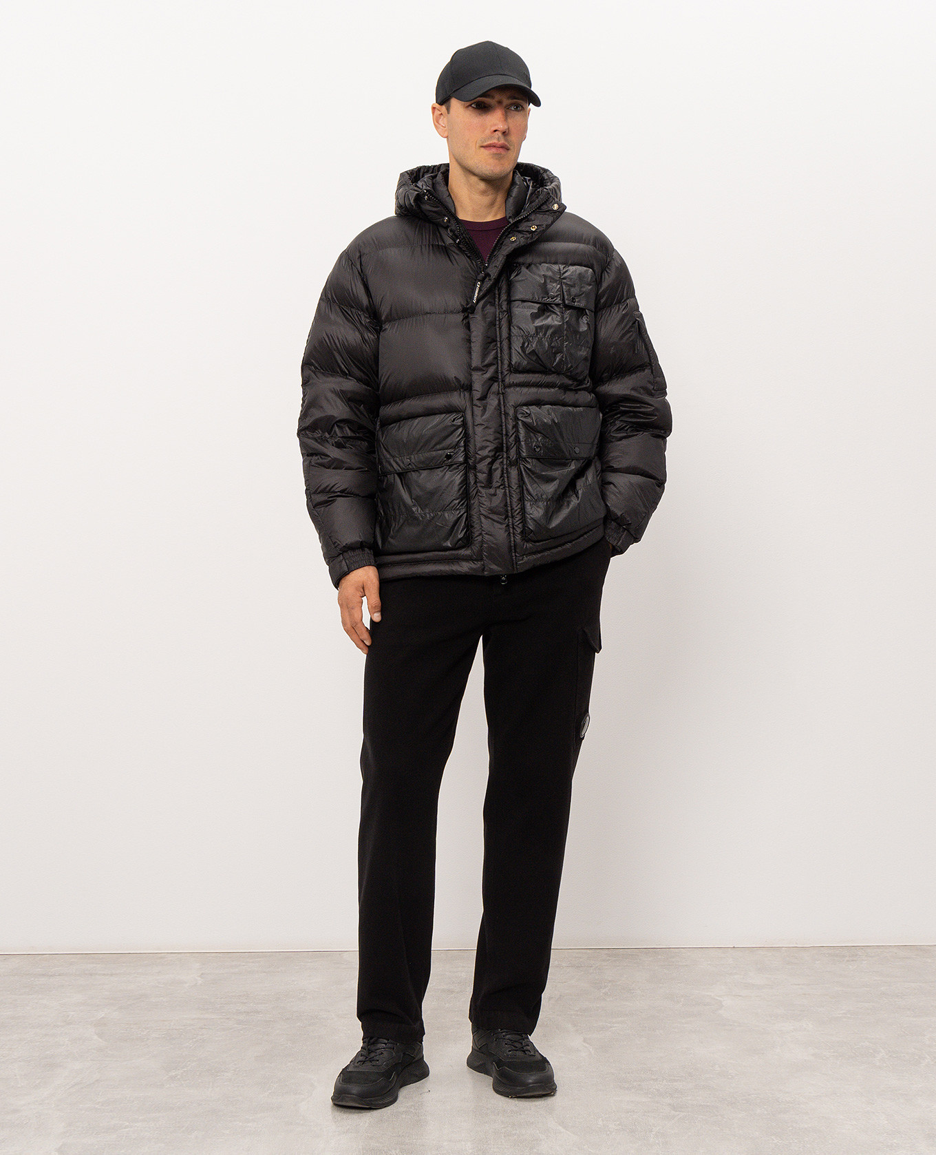 Black down jacket with logo patch C.P. Company 2
