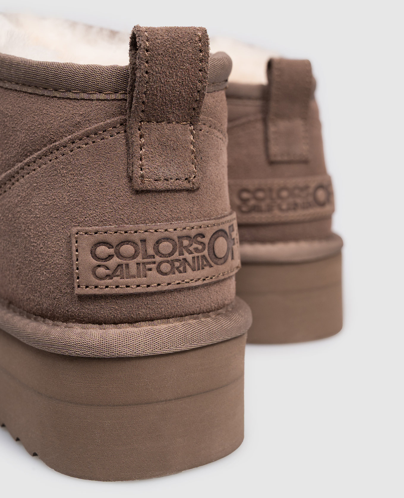 

Brown suede platform boots with fur trim Colors of California