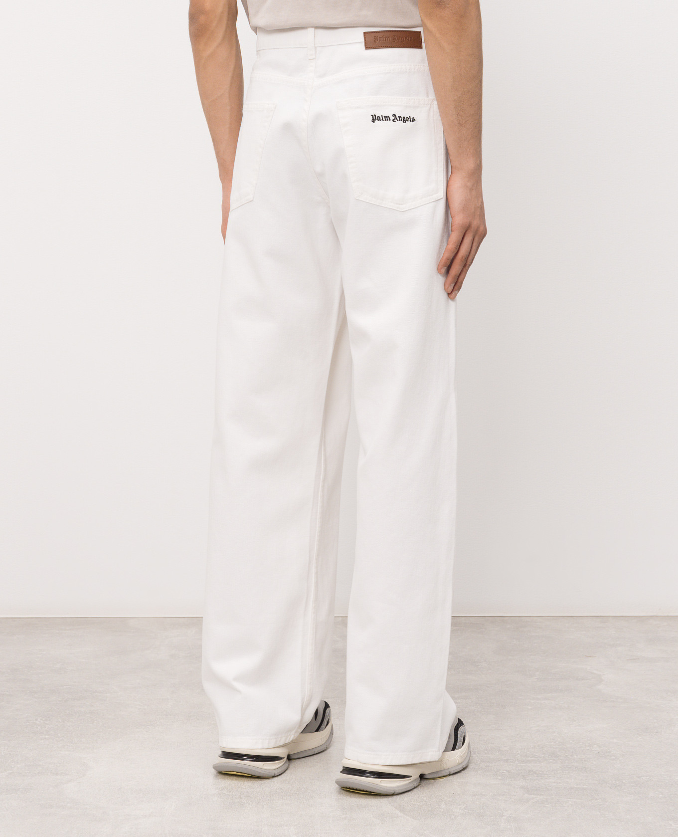 

Ivory jeans with logo embroidery Palm Angels, Beige