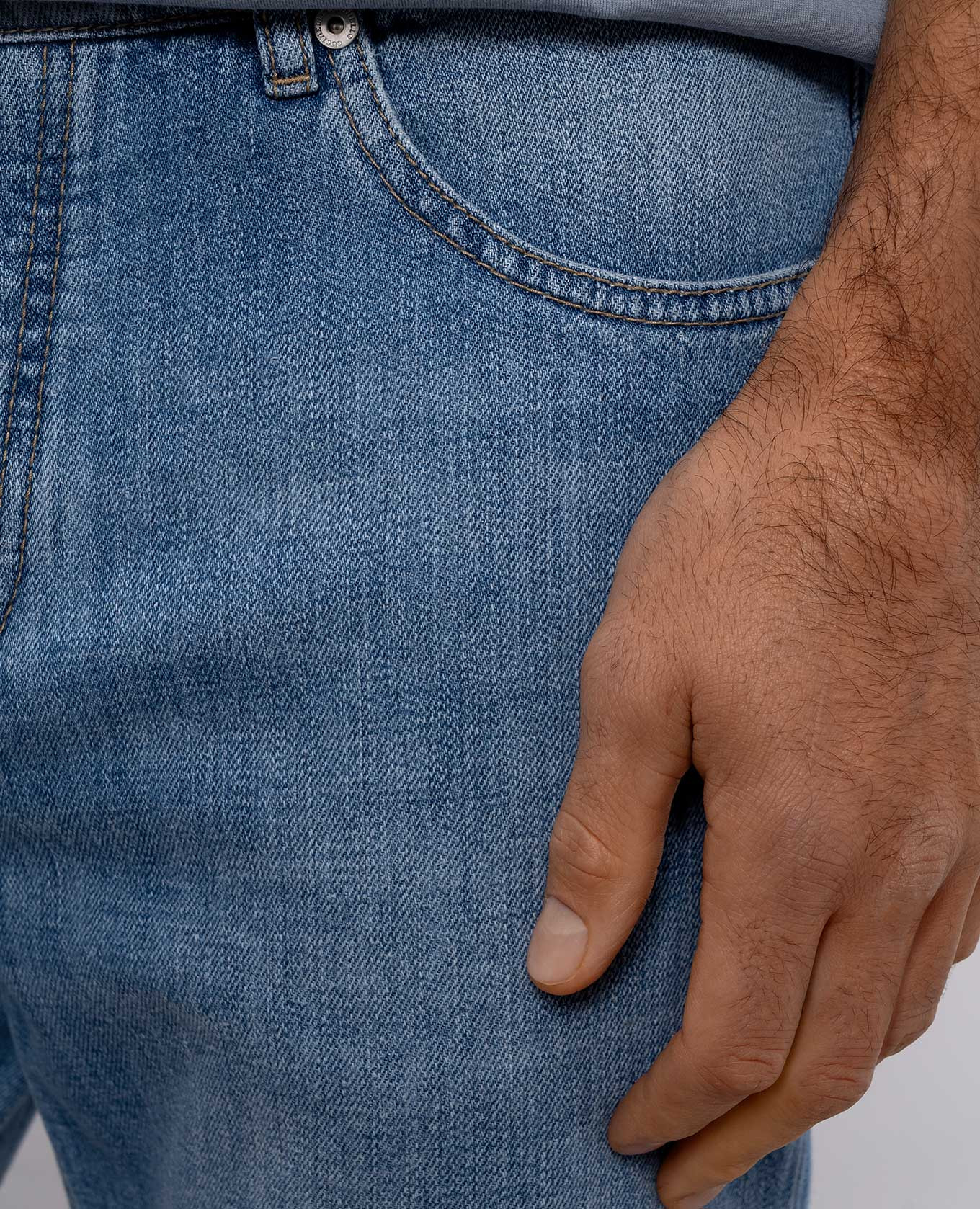 Blue jeans with embroidered emblem Brunello Cucinelli 5