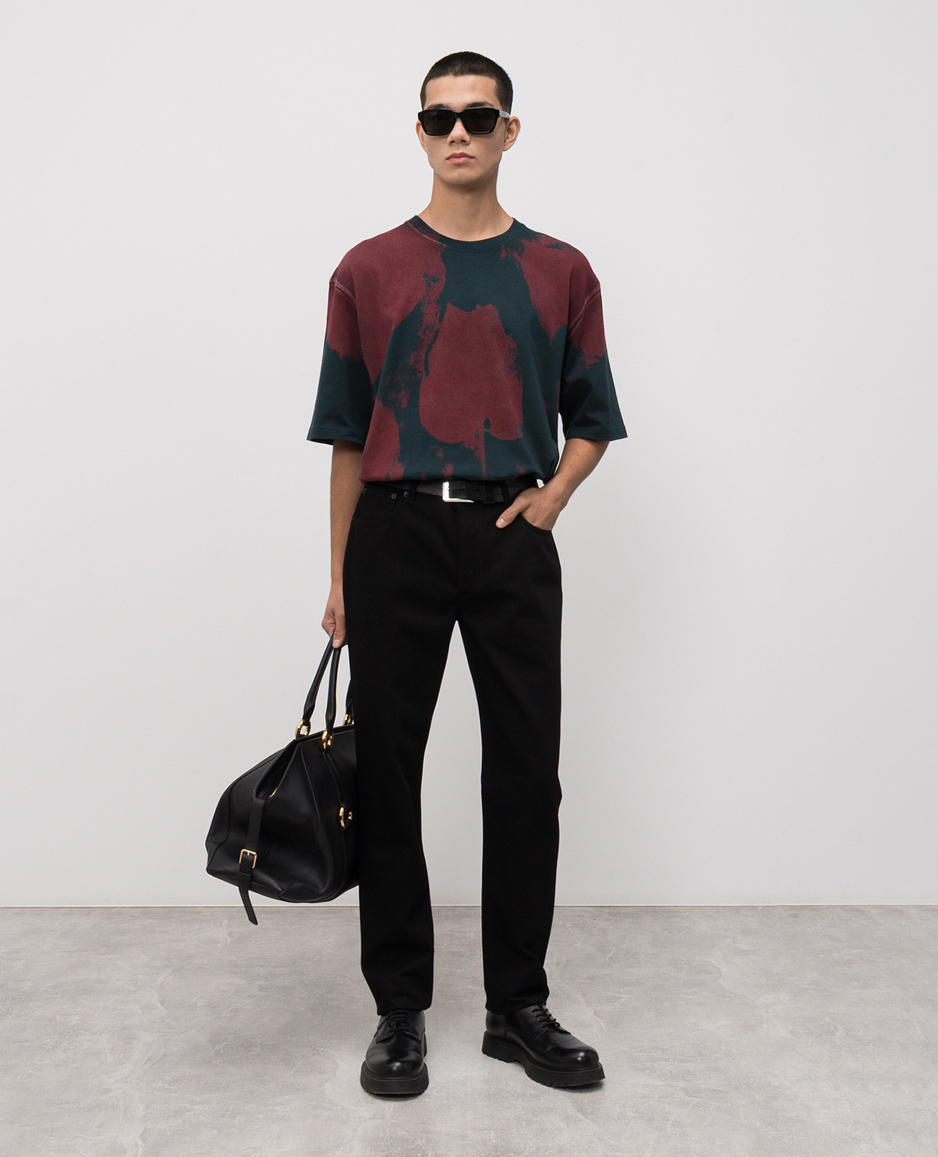 

Black jeans with a patch Alexander McQueen