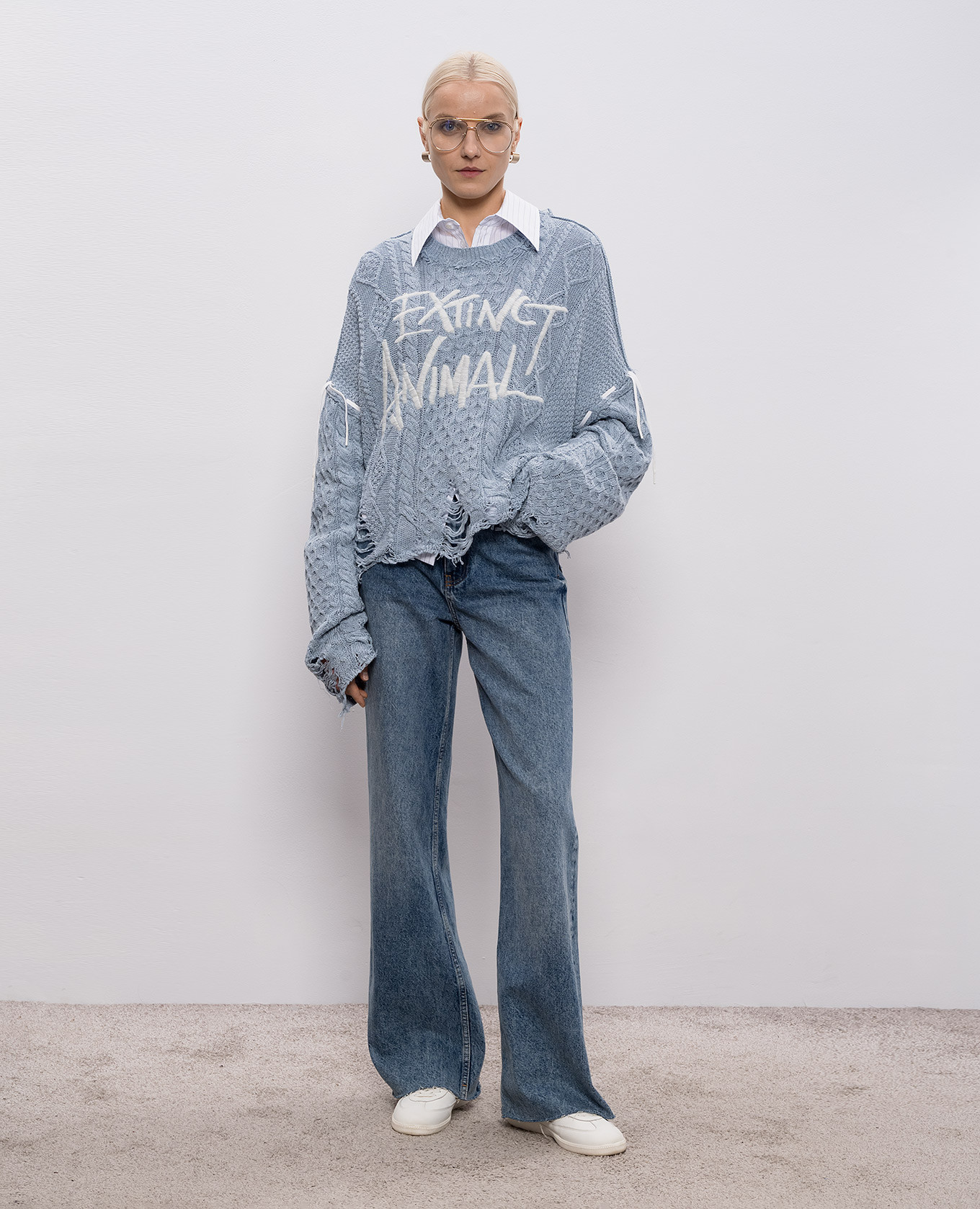 

Blue Konfetto sweater with patterned slits SSHEENA, Light blue