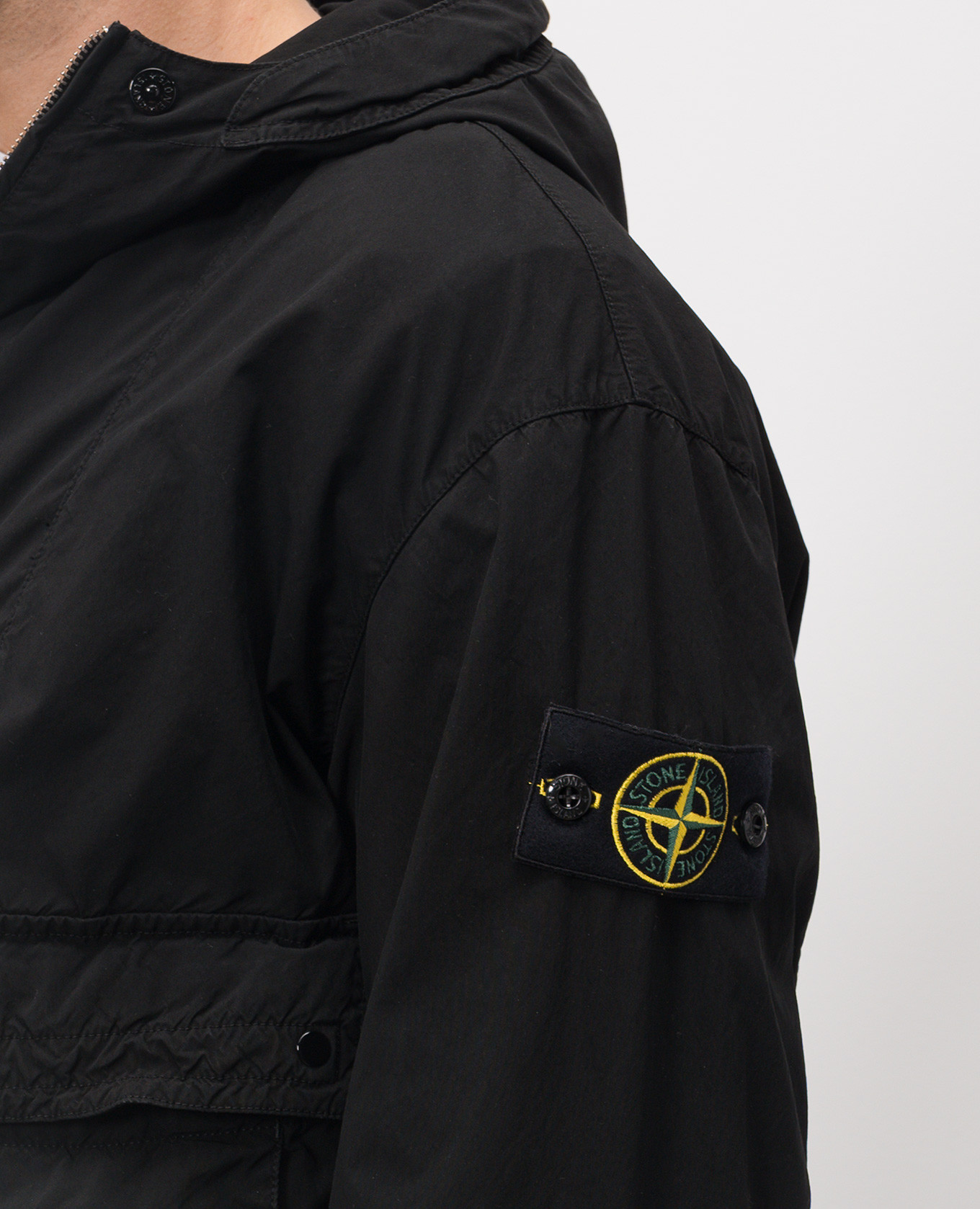 

Black jacket with logo patch Stone Island