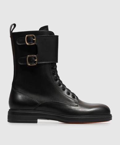 Black leather boots with straps