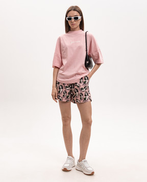 Palm Angels Pink shorts with pin-up print PWCB059S26FAB001