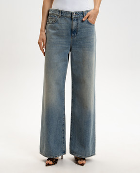 Alexander McQueen Blue jeans with a worn effect 848913QMAD0