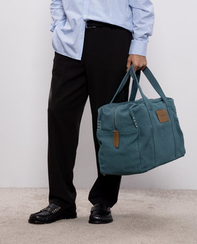 JW Anderson Blue Weekender travel bag with logo HB0771FA0484