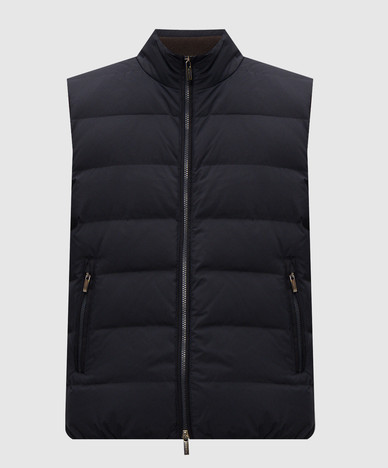 Blue down vest with logo patch
