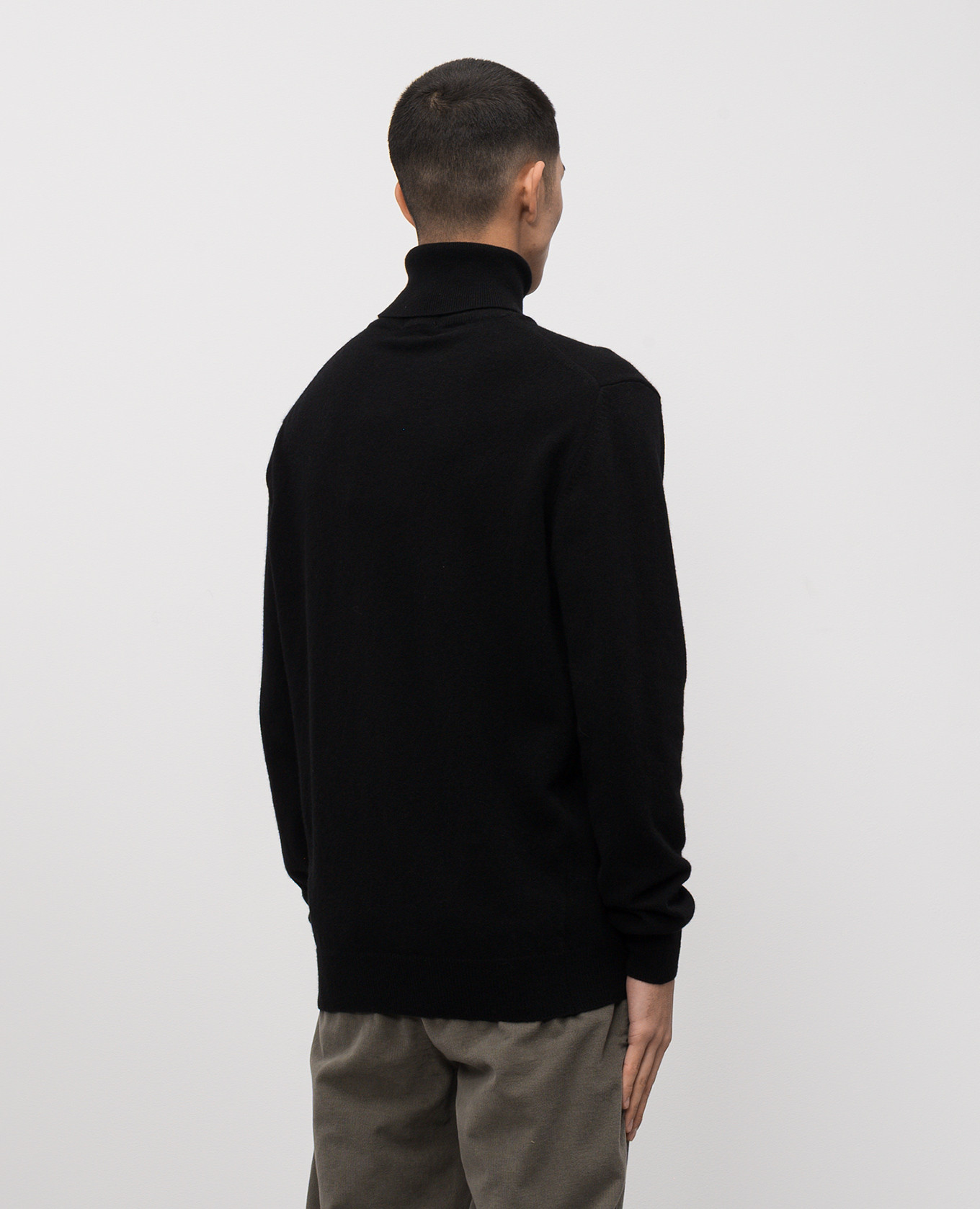 

Black wool golf Woolrich