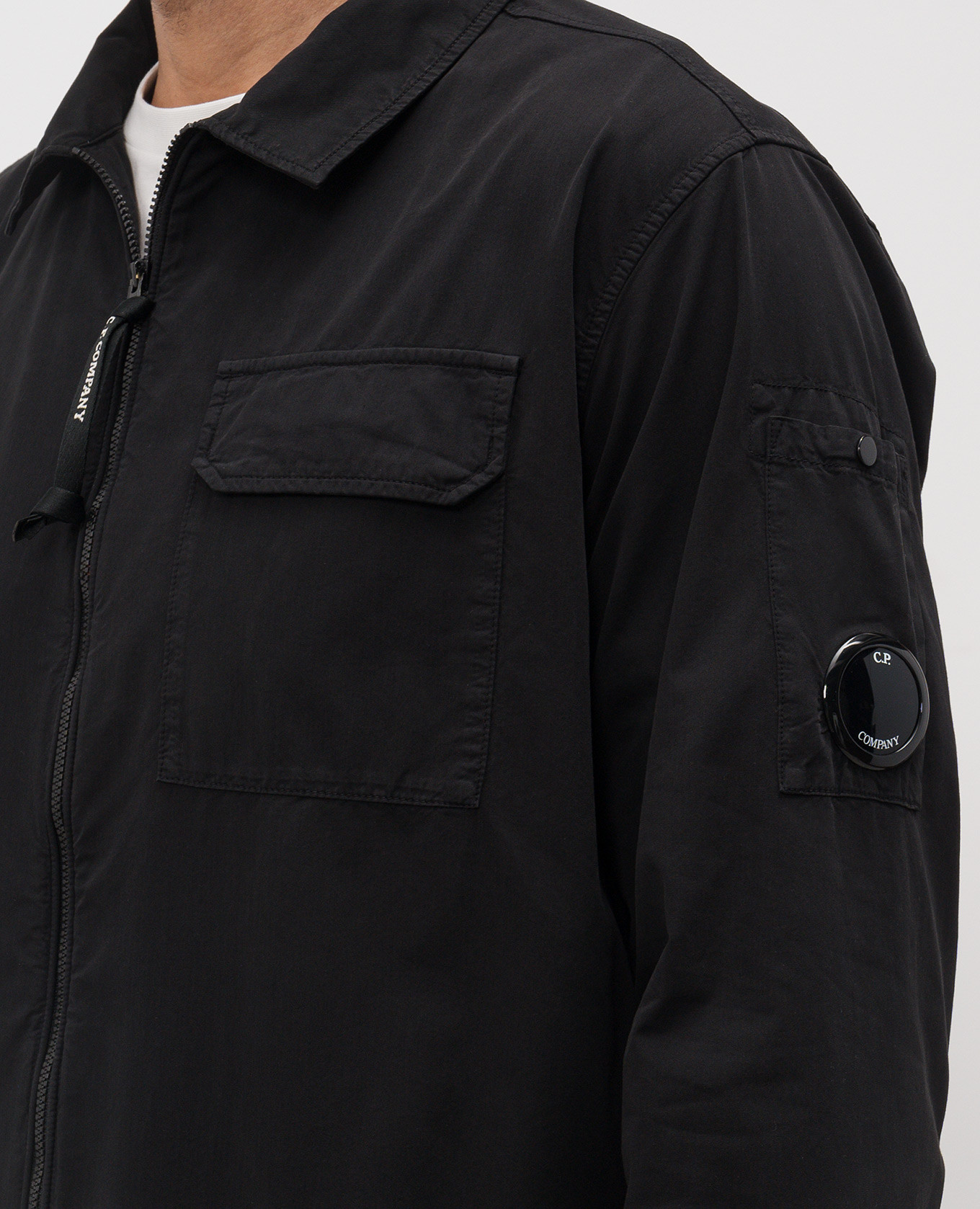 

Black zip-up shirt with logo C.P. Company