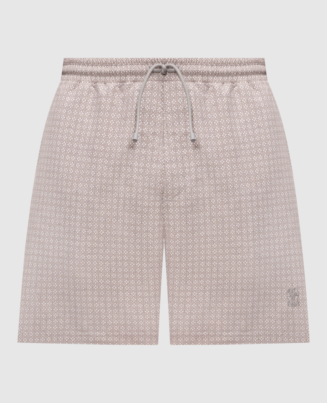 Beige patterned swim shorts with embroidered logo
