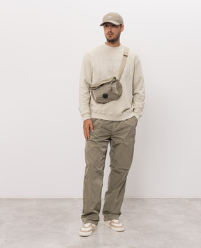 C.P. Company Khaki pants with logo patch MPA109A005904G