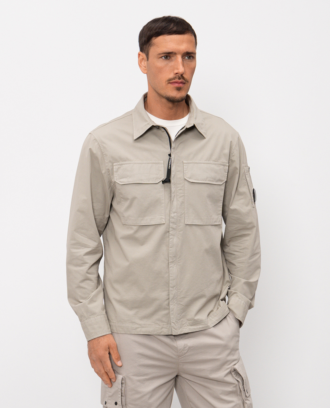 

Beige zip-up shirt with logo patch C.P. Company