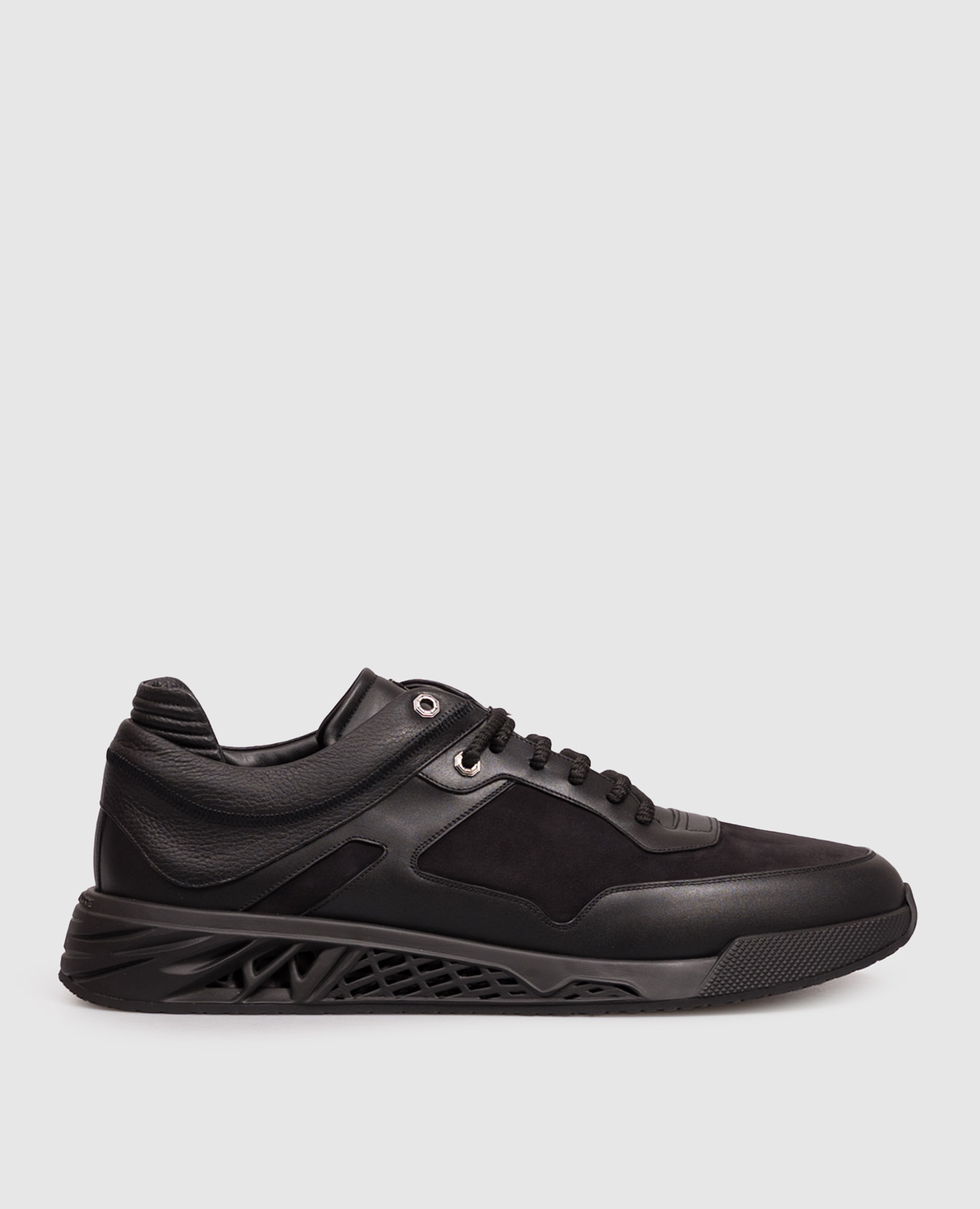 Black leather sneakers with textured logo
