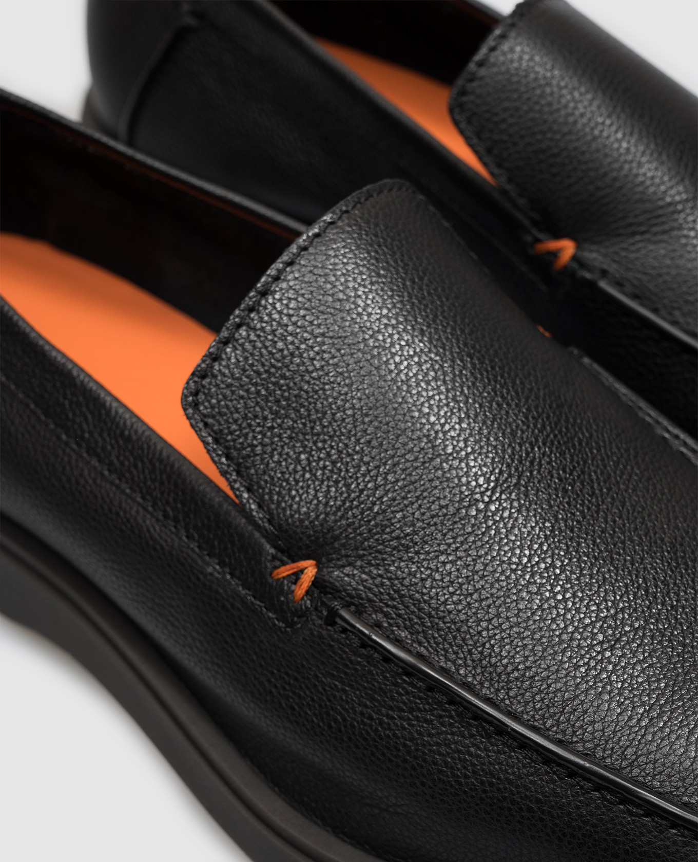 Black leather loafers with textured logo Santoni 5