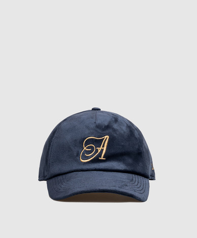 Blue velour cap with monogram embroidery