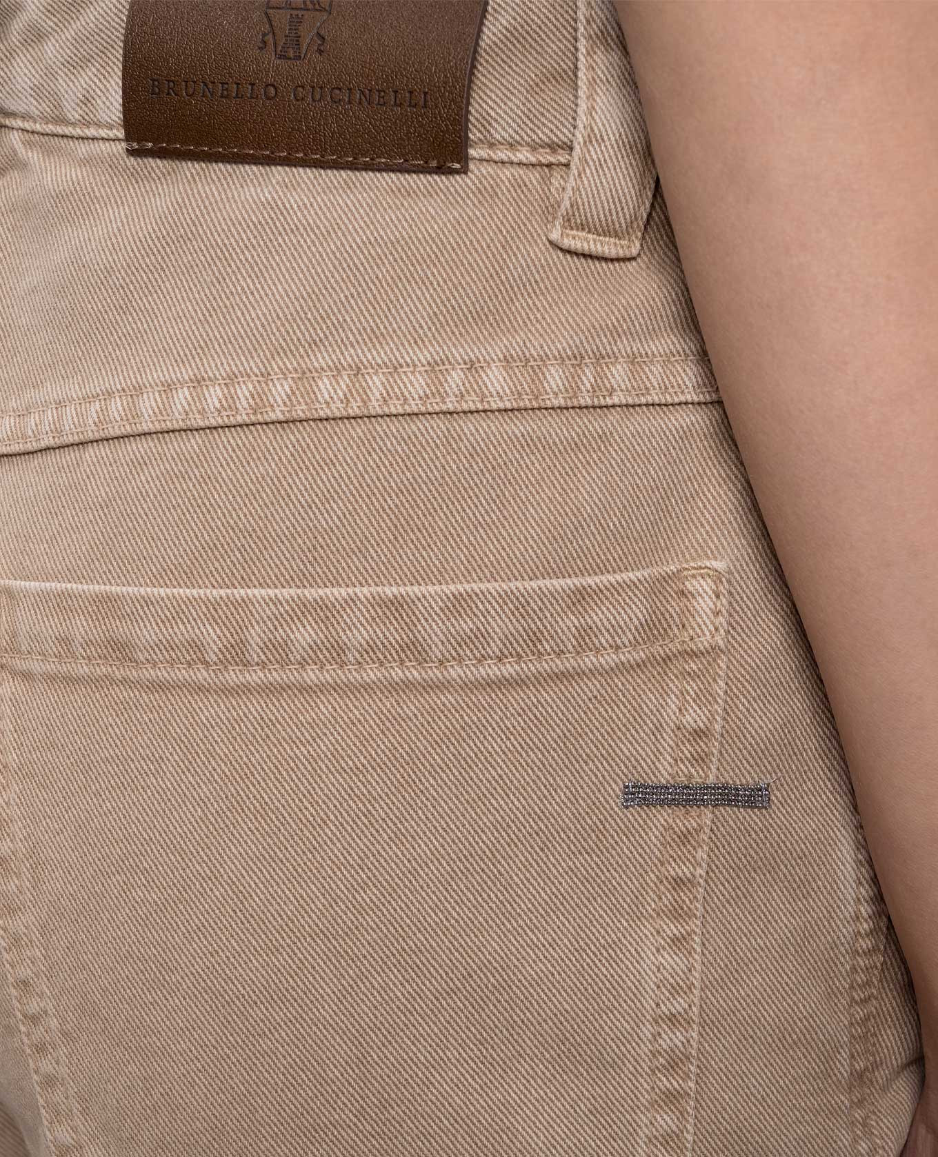 

Beige jeans with a chain Brunello Cucinelli