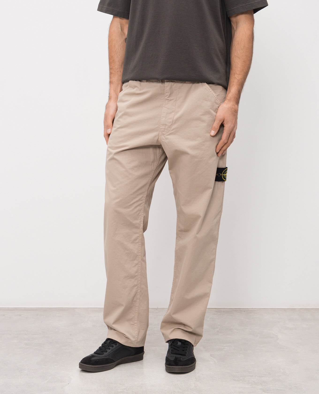 

Beige pants with a patch Stone Island