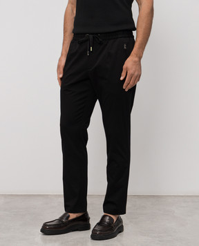Dolce&Gabbana Black pants with logo patch GVZAETGK302